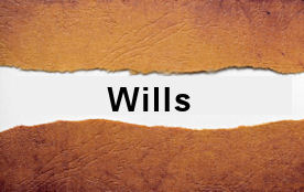 Brown torn paper revealing "Wills